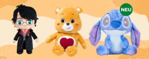 Darstellung der FREUDEBOX Geschenkbox mit einer Grußkarte auf orangenem Hintergrund